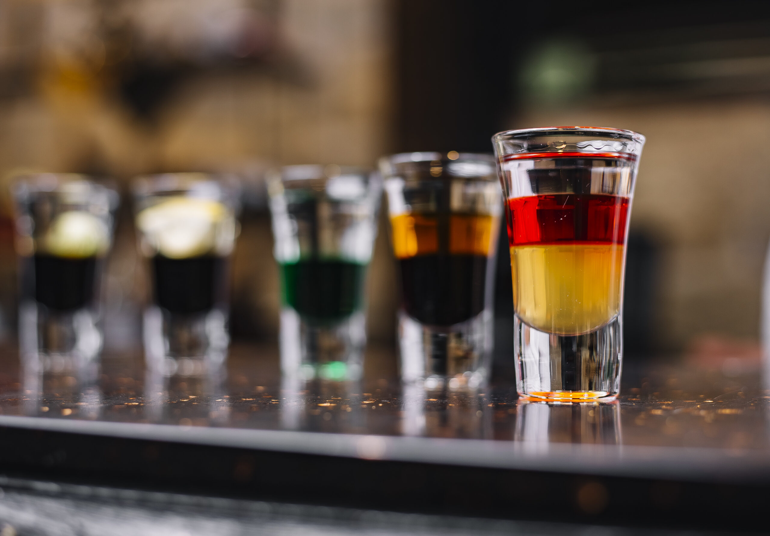side-view-colorful-cocktails-shot-glasses-bar-stand-scaled-1.jpg side-view-colorful-cocktails-shot-glasses-bar-stand-scaled-1.jpg